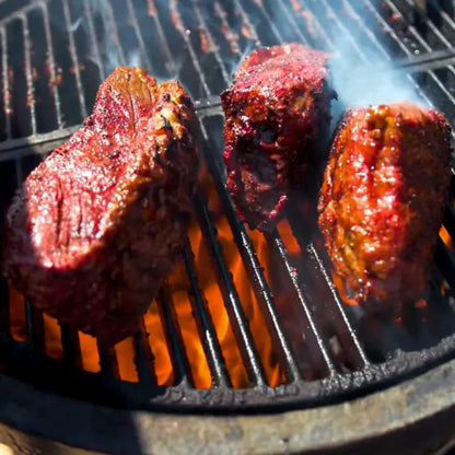 Gjutjärn Kamado med vagn och bordsskivor i stål och allt i utrustning.